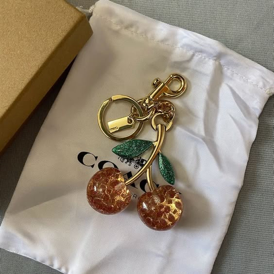 Coach cherry charms