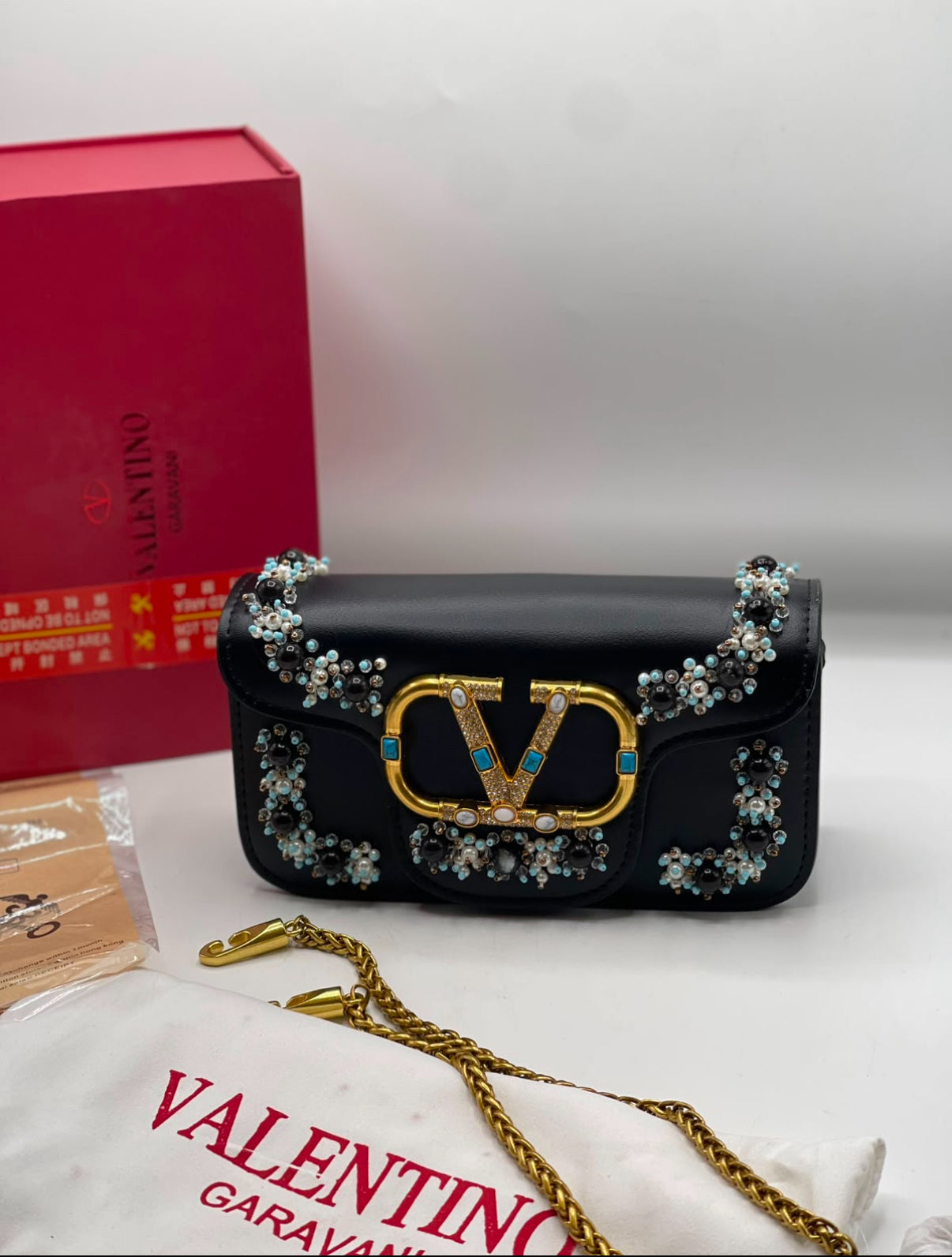 Valentino Garavani Locò Bags