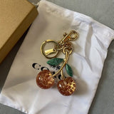Coach cherry charms