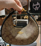 Coach Jonie with Brand Box